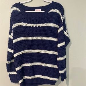 Pink lily sweater. Size small.